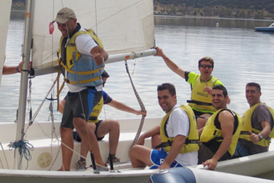 Event by the lake with staff rowing a boat